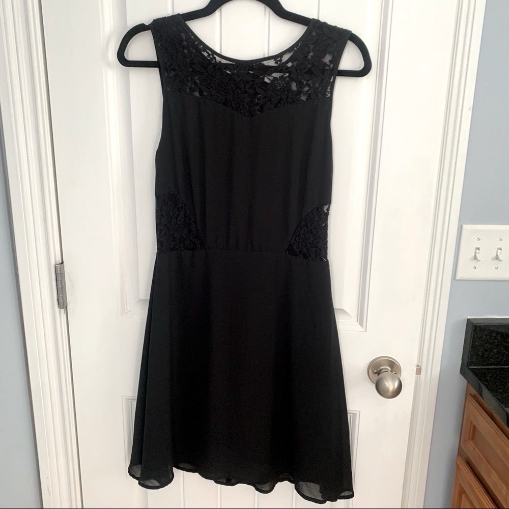 Black dress with lace cutouts